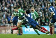 11 February 2007; Ronan O'Gara, Ireland, is tackled by Serge Betsen, France. RBS Six Nations Rugby Championship, Ireland v France, Croke Park, Dublin. Picture Credit: Brendan Moran / SPORTSFILE