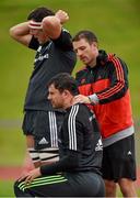 15 September 2014; Munster's Felix Jones receives treatment from physio Colm Coakley during squad training ahead of their side's Guinness PRO12, Round 3, match against Zebre on Friday. Munster Rugby Squad Training, University of Limerick, Limerick. Picture credit: Diarmuid Greene / SPORTSFILE