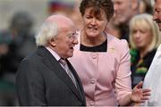 14 September 2014; President of Ireland Michael D. Higgins is introduced to the match officials by Aileen Lawlor, President of the Camogie Association. Liberty Insurance All Ireland Senior Camogie Championship Final, Kilkenny v Cork, Croke Park, Dublin. Picture credit: Ramsey Cardy / SPORTSFILE