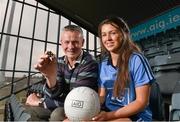 16 September 2014; Dublin ladies footballer Leah Caffrey and her dad John, who was part of the 1983 All-Ireland winning Dublin men’s team were at Parnell Park today to mark the launch of AIG’s free Dublin jersey promotion. AIG is rewarding customers who take out a new car or home insurance policy from www.aig.ie or 1890 27 27 27 with a free kids’ Dublin jersey, or €40 off an adults’ Dublin jersey. Vouchers should be redeemed on the O’Neill’s website: http://www.oneills.com/aig.html. Photo by Sportsfile