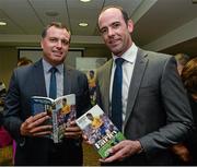 16 September 2014; Ireland International Rules manager Paul Earley, left, with Dermot Earley junior at the launch of the authorised Biography of the Late Dermot Earley, entitled &quot;Dermot Earley, An Officer And A Gentleman&quot; by John Scally. Croke Park, Dublin. Picture credit: David Maher / SPORTSFILE