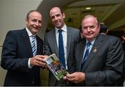 16 September 2014; Dermot Earley junior with Fianna Fail leader Michael Martin T.D., left, and Uachtarán Chumann Lúthchleas Gael Liam Ó Néill, right, at the  launch of the authorised Biography of the Late Dermot Earley, entitled &quot;Dermot Earley, An Officer And A Gentleman&quot; by John Scally. Croke Park, Dublin. Picture credit: David Maher / SPORTSFILE