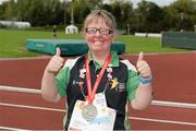 18 September 2014; Team Ireland's Philomena Doherty, from Castlefin Co. Donegal, celebrates after being presented with a Silver Medal after winning the 100m walk event at the Den UYT Sports Centre. 2014 Special Olympics European Games, Antwerp, Belgium. Picture credit: Ray McManus / SPORTSFILE