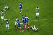 11 February 2007; France's Vincent Clerc, 14, is congratulated on scoring his side's last minute game winning try as Irish players look dejected. RBS Six Nations Rugby Championship, Ireland v France, Croke Park, Dublin. Picture credit: Ray McManus / SPORTSFILE