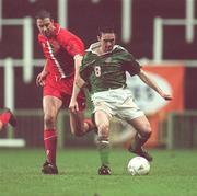 11 February 1997; Alan McLoughlin, Republic of Ireland, in action against Kit Symons, Wales. International Friendly, Wales v Republic of Ireland, Cardiff Arms Park, Cardiff, Wales. Picture credit; David Maher / SPORTSFILE