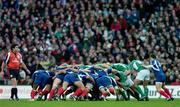 11 February 2007; The Irish and French packs engage in a scrum watched by referee Steve Walsh and the crowd in the Davin Stand. RBS Six Nations Rugby Championship, Ireland v France, Croke Park, Dublin. Picture Credit: Brendan Moran / SPORTSFILE