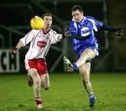 13 February 2007; Vincent Corey, Monaghan, in action against Tommy McGuigan, Tyrone. McKenna Cup Semi-Final, Tyrone v Monaghan, Kingspan Breffni Park, Co. Cavan. Picture credit: Oliver McVeigh / SPORTSFILE