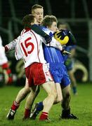 13 February 2007; Donal Morgan, Monaghan, in action against Aiden McCarron and Kelvin Hughes, Tyrone. McKenna Cup Semi-Final, Tyrone v Monaghan, Kingspan Breffni Park, Co. Cavan. Picture credit: Oliver McVeigh / SPORTSFILE