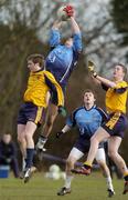 14 February 2007; Jonathan Bradley, UUJ, in action against Cathal Craig, and Kevin Reilly, right, DCU. Sigerson Cup 2nd Round, DCU v UUJ, Dublin City University, Dublin. Picture credit: Brian Lawless / SPORTSFILE