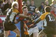 17 February 2007; Conal Keane, Clontarf, is tackled by William Wallace, left, and Colin Finnerty, Buccaneers. AIB League, Division 1, Clontarf v Buccaneers, Castle Avenue, Clontarf, Dublin. Picture credit: Pat Murphy / SPORTSFILE
