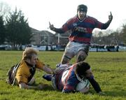 17 February 2007; Niall McNamara, Clontarf, goes over for a try despite the challenge of Tom Cregan, Buccaneers, while Martin Garvey, back, celebrates. AIB League, Division 1, Clontarf v Buccaneers, Castle Avenue, Clontarf, Dublin. Picture credit: Pat Murphy / SPORTSFILE