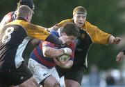 17 February 2007; Derek Keane, Clontarf, is tackled by Adrian Hanley, left, and Killian O'Neill, Buccaneers. AIB League, Division 1, Clontarf v Buccaneers, Castle Avenue, Clontarf, Dublin. Picture credit: Pat Murphy / SPORTSFILE