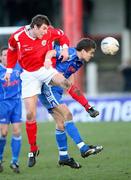 17 February 2007; Vincent Sweeney, Cliftonville, in action against Ryan McCluskey, Dungannon Swifts. Carnegie Premier League, Cliftonville v Dungannon Swifts, Solitude, Belfast, Co. Antrim. Picture credit: Russell Pritchard / SPORTSFILE