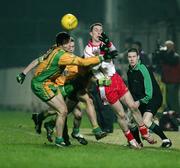 17 February 2007; Tommy McGuigan, Tyrone, in action against Brendan Devenney, Christy Toye, and Barry Dunnion, Donegal. McKenna Cup Final, Donegal v Tyrone, Healy Park, Omagh, Co. Tyrone. Picture credit: Oliver McVeigh / SPORTSFILE