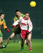 17 February 2007; Tommy McGuigan, Tyrone, in action against Christy Toye, Donegal. McKenna Cup Final, Donegal v Tyrone, Healy Park, Omagh, Co. Tyrone. Picture credit: Oliver McVeigh / SPORTSFILE
