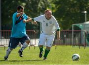 19 September 2014; Team Ireland's Peter Kavanagh, from Ennis, Co Clare - who scored a hat-trick in the 4-0 win - in action against Ezra Avraham of Israel in the final of the seven a side competition at the Het Rooi Sports Centre in Antwerp. 2014 Special Olympics European Games, Antwerp, Belgium. Picture credit: Ray McManus / SPORTSFILE
