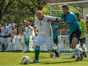 19 September 2014; Team Ireland's Peter Kavanagh, from Ennis, Co Clare - who scored a hat trick in the 4-0 win - is tackled by Asi Asaf Abutbul of Israel in the final of the seven a side competition in the Het Rooi Sports Centre in Antwerp. 2014 Special Olympics European Games, Antwerp, Belgium. Picture credit: Ray McManus / SPORTSFILE