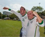 19 September 2014; Team Ireland's Conor Crowley, left, from Ballincollig, Co Cork, and a member of Ballincollig Special Olympics Club, celebrates with Peter Kavanagh, from Ennis, Co Clare, who scored a hat-trick in the 4-0 win in the final of the seven a side competition at the Het Rooi Sports Centre in Antwerp. 2014 Special Olympics European Games, Antwerp, Belgium. Picture credit: Ray McManus / SPORTSFILE