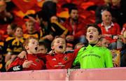 19 September 2014; Three young Munster supporters sing along to &quot;Stand Up and Fight&quot; before the game. Guinness PRO12, Round 3,  Munster v Zebre. Thomond Park, Limerick. Picture credit: Diarmuid Greene / SPORTSFILE