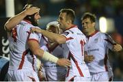 19 September 2014; Dan Tuohy, left, Ulster, is is congratulated by team-mates after scoring his side's first try. Guinness PRO12, Round 3, Cardiff Blues v Ulster. BT Sport Cardiff Arms Park, Cardiff, Wales. Picture credit: Ian Cook / SPORTSFILE