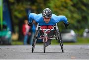 20 September 2014; Patrick Monaghan, Naas AC, on his way to winning the wheelchair race at the SSE Airtricity Dublin Race Series Half Marathon. Phoenix Park, Dublin. Picture credit: Pat Murphy / SPORTSFILE