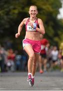 20 September 2014; Patricia Wlodarczyk, Raheny Shamrocks AC, on her way to winning the Women's race at the SSE Airtricity Dublin Race Series Half Marathon. Phoenix Park, Dublin. Picture credit: Pat Murphy / SPORTSFILE