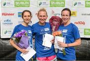20 September 2014; Race winner Patricia Wlodarczyk, Raheny Shamrocks AC, with second placed Fiona Stack, Raheny Shamrocks AC, left, and third placed Justine O'Connell Urell, Dundrum South Dublin AC, right, after the SSE Airtricity Dublin Race Series Half Marathon. Phoenix Park, Dublin. Picture credit: Pat Murphy / SPORTSFILE