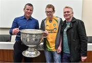 20 September 2014; Dara Ó Cinnéide is the latest to feature on the Bord Gáis Energy Legends Tour Series 2014 when he gave a unique tour of the Croke Park stadium and facilities this week. Pictured is Dara Ó Cinnéide and the Sam Maguire Cup with Adrian and Cyril Dunnion from Dublin. Croke Park, Dublin. Photo by Sportsfile