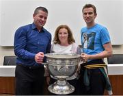 20 September 2014; Dara Ó Cinnéide is the latest to feature on the Bord Gáis Energy Legends Tour Series 2014 when he gave a unique tour of the Croke Park stadium and facilities this week. Pictured is Dara Ó Cinnéide and the Sam Maguire Cup with Norma Myers and Denis Naughton from Killarney, Co. Kerry . Croke Park, Dublin. Photo by Sportsfile