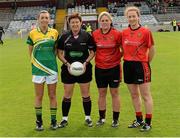30 August 2014; Referee Mags Doherty, centre, along with Sarah McLoughlin, Leitrim Captain, left, and Kyla Trainor and Niamh McGowan, Down joint Captains. TG4 All-Ireland Ladies Football Intermediate Championship, Semi-Final, Down v Leitrim, Cusack Park, Mullingar, Co. Westmeath. Picture credit: Oliver McVeigh / SPORTSFILE