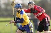 18 February 2007; Alan Markham, Clare, in action against Brendan McGourty, Down. Allianz National Hurling League Division 1A, Round 1, Down v Clare, Portaferry, Down. Photo by Sportsfile *** Local Caption ***