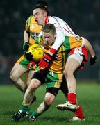 17 February 2007; Brian Roper, Donegal, in action against Christopher Colhoun, Tyrone. McKenna Cup Final, Donegal v Tyrone, Healy Park, Omagh, Co. Tyrone. Picture credit: Oliver McVeigh / SPORTSFILE