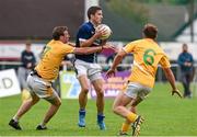 20 September 2014; Sean Kelly St. Galls, in action against Barry O'Hagan, left, and Darren O'Hagan, Clonduff, in the semi-final stage of the 2014 Kilmacud Crokes FBD 7s. Páirc de Búrca, Glenalbyn, Stillorgan, Co. Dublin. Picture credit: Ramsey Cardy / SPORTSFILE