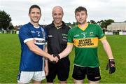 20 September 2014; Team captains Sean Kelly, St. Galls, left, and Luke Howard, Bryansford, with referee Cormac Reilly ahead of the final. 2014 Kilmacud Crokes FBD 7s, Páirc de Búrca, Glenalbyn, Stillorgan, Co. Dublin. Picture credit: Ramsey Cardy / SPORTSFILE