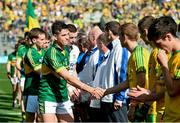 21 September 2014; Kerry captain Liam Kearney shakes hands with the Donegal players before the game. Electric Ireland GAA Football All Ireland Minor Championship Final, Kerry v Donegal. Croke Park, Dublin. Picture credit: Ramsey Cardy / SPORTSFILE