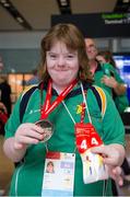 21 September 2014; Team Ireland's Katie Dillon, from Ballinasloe, Co Galway, and a member of Mountbellew Tigers Special Olympics Club, pictured at Dublin Airport on their return from the 2014 Special Olympics European Games in Antwerp, Belgium. Dublin Airport, Dublin. Picture credit: Tomás Greally / SPORTSFILE