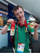 21 September 2014; Team Ireland's Michael Lafferty, from Drumalee, Co Cavan, and a member of Breffni Blues Special Olympics Club, pictured at Dublin Airport on his return from the 2014 Special Olympics European Games in Antwerp, Belgium. Dublin Airport, Dublin. Picture credit: Tomás Greally / SPORTSFILE