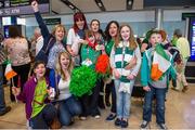 21 September 2014; Team Ireland's Shauna Bloom, from Dundrum, Co Tipperary, and a member of Tipperary Special Olympics Club, is welcomed by family and friends in Dublin Airport on her return from the 2014 Special Olympics European Games in Antwerp, Belgium. Dublin Airport, Dublin. Picture credit: Tomás Greally / SPORTSFILE