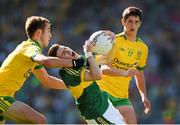 21 September 2014; Jordan Kiely, Kerry, tackled by Colm Kelly, Donegal. Electric Ireland GAA Football All Ireland Minor Championship Final, Kerry v Donegal. Croke Park, Dublin. Picture credit: Ray McManus / SPORTSFILE