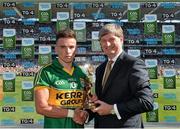 21 September 2014; Pat O'Doherty, ESB Chief Executive, presents Micheál Burns from Kerry with the Electric Ireland Man of the Match award for his outstanding performance in today's Electric Ireland GAA Football All Ireland Minor Championship Final. Croke Park, Dublin. Picture credit: Brendan Moran / SPORTSFILE