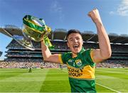 21 September 2014; Kerry captain Liam Kearney celebrates with the Tom Markham cup. Electric Ireland GAA Football All Ireland Minor Championship Final, Kerry v Donegal. Croke Park, Dublin.  Picture credit: Ramsey Cardy / SPORTSFILE