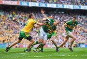21 September 2014; Kieran Donaghy, Kerry, in action against Éamonn McGee, left, and Leo McLoone, Donegal. GAA Football All Ireland Senior Championship Final, Kerry v Donegal. Croke Park, Dublin. Picture credit: Ramsey Cardy / SPORTSFILE