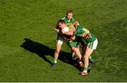 21 September 2014; Leo McLoone, Donegal, in action against Peter Crowley, left, and Marc Ó Sé, Kerry. GAA Football All Ireland Senior Championship Final, Kerry v Donegal. Croke Park, Dublin. Picture credit: Dáire Brennan / SPORTSFILE