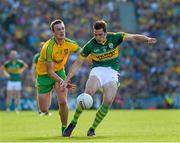 21 September 2014; David Moran, Kerry, in action against Leo McLoone, Donegal. GAA Football All Ireland Senior Championship Final, Kerry v Donegal. Croke Park, Dublin. Picture credit: Ray McManus / SPORTSFILE