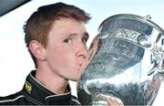 21 September 2014; Stephen Daly, from Dunshaughlin, Co. Meath, kisses the Leinster Trophy after winning the Formula Ford race. Leinster Trophy Car Races, Mondello Park, Donore, Naas, Co. Kildare. Picture credit: Barry Cregg / SPORTSFILE