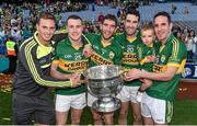 21 September 2014; Kerry players, from left, Paul O'Donoghue, Mark Griffin, Killian Young, Bryan Sheehan and Declan O'Sullivan, with his son Ollie, following their side's victory. GAA Football All Ireland Senior Championship Final, Kerry v Donegal. Croke Park, Dublin. Picture credit: Stephen McCarthy / SPORTSFILE