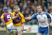 18 February 2007; Tomas Mahon, Wexford, in action against Eoin McGrath, Waterford. Allianz National Hurling League, Division 1A, Round 1, Wexford v Waterford, Wexford Park, Wexford. Picture credit: Matt Browne / SPORTSFILE