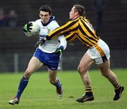 3 December 2006; Kevin McGuckin, Ballinderry, in action against John McEntee, Crossmaglen Rangers. AIB Ulster Club Senior Football Championship Final, Ballinderry v Crossmaglen Rangers, Casement Park, Belfast, Co. Antrim. Picture credit: Oliver McVeigh / SPORTSFILE