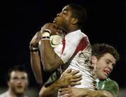 23 February 2007; Selorm Kuadey, England, is tackled by Daeewn Cave, Ireland. Under 20 Six Nations Rugby Championship, Ireland v England, Dubarry Park, Athlone, Co. Westmeath. Picture Credit: Matt Browne / SPORTSFILE