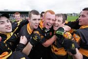24 February 2007; Dr Crokes players, from left, Michael Moloney, Brian McMahon, Eanna Kavanagh and James Cahalane celebrate with supporters after the final whistle. AIB All-Ireland Club Football Semi-Final Replay, Moorefield v Dr Crokes, McDonagh Park, Nenagh, Co. Tipperary. Picture Credit: Kieran Clancy / SPORTSFILE
